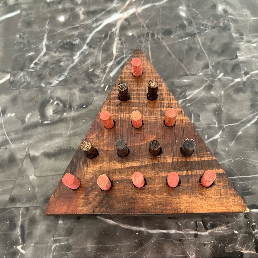 Handmade Wooden Triangle Peg Puzzle - Brown with Red & Black Pegs